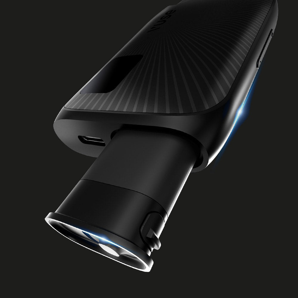 Vuse | Gros plan sur une batterie VUSE Vuse Ultra, un appareil électronique noir aux lignes épurées et aux contours texturés, rehaussé d'une touche bleue lumineuse, partiellement inséré sur un fond sombre. | Cigarettes Electroniques et Recharges